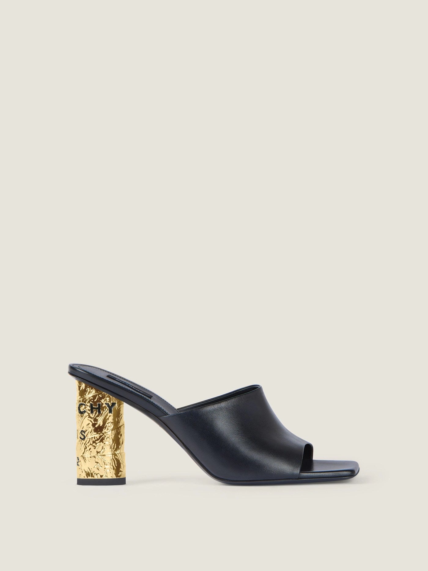 Tape heeled mules in leather