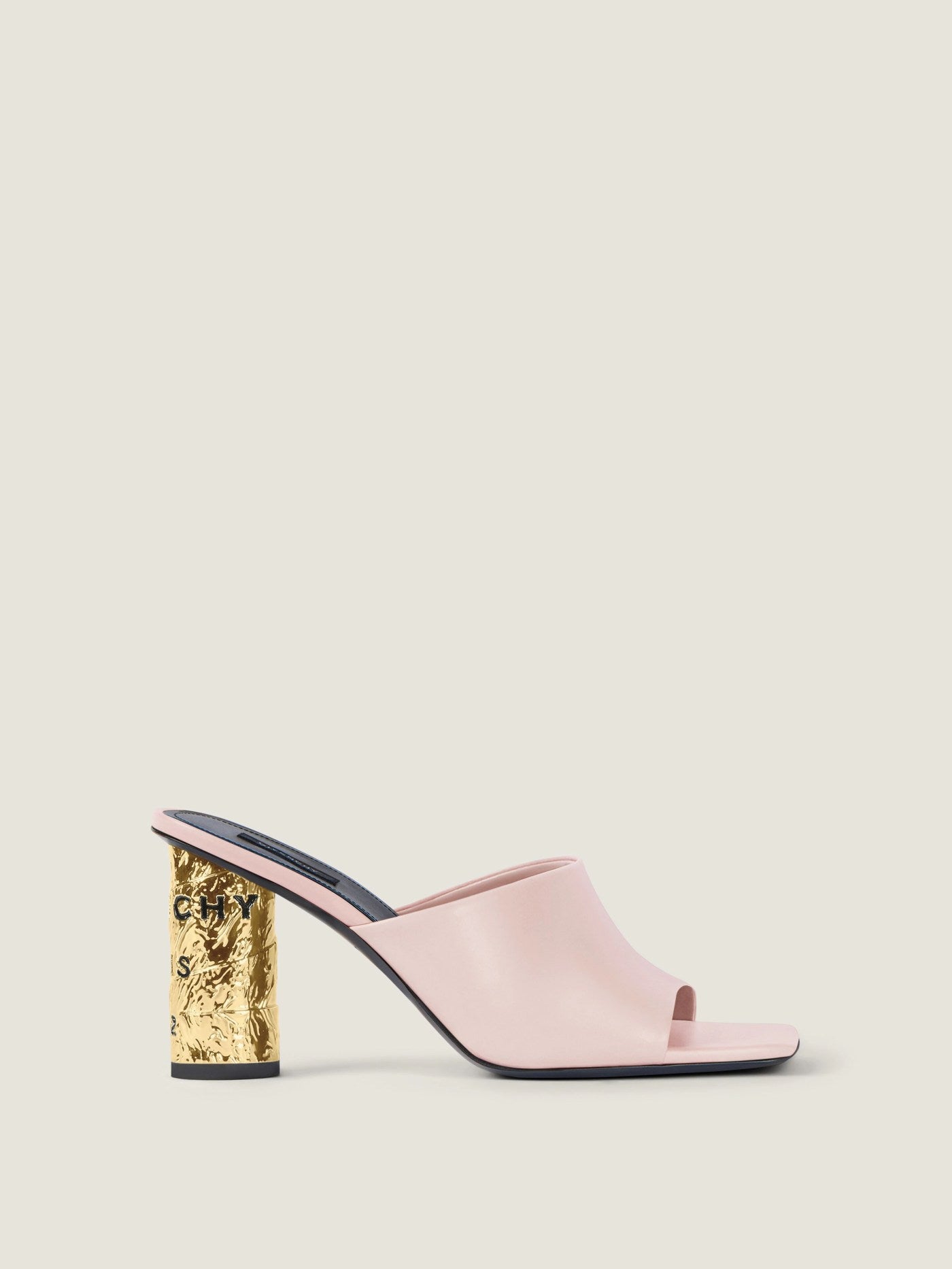 Tape heeled mules in leather