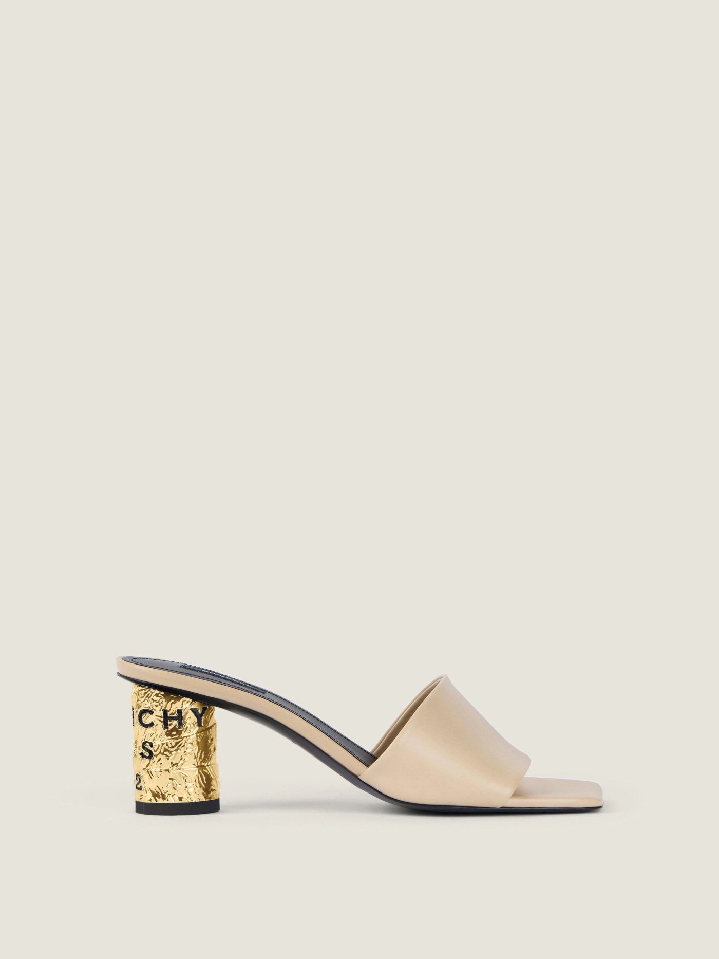 Tape heeled mules in leather