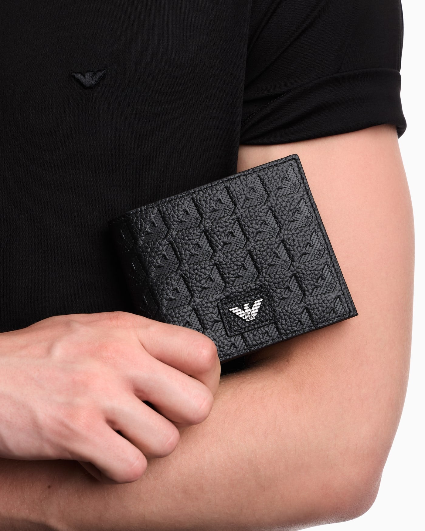 Leather coin-pocket wallet with all-over embossed eagle