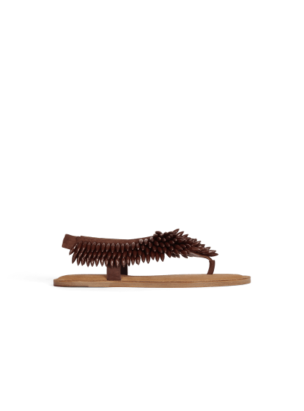 Flat sandals in suede and beads