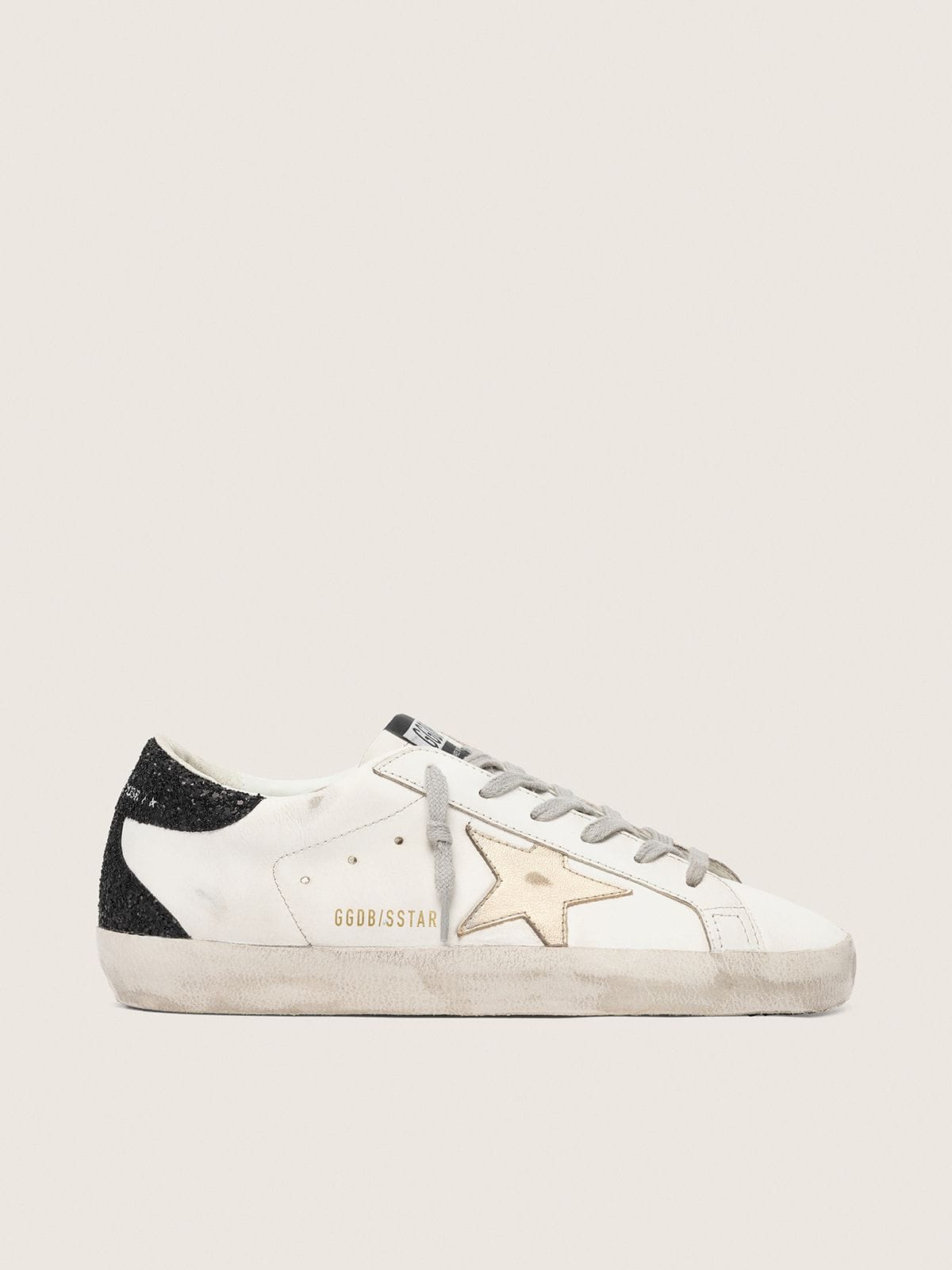 Women's Super-Star with gold star and black glitter heel tab