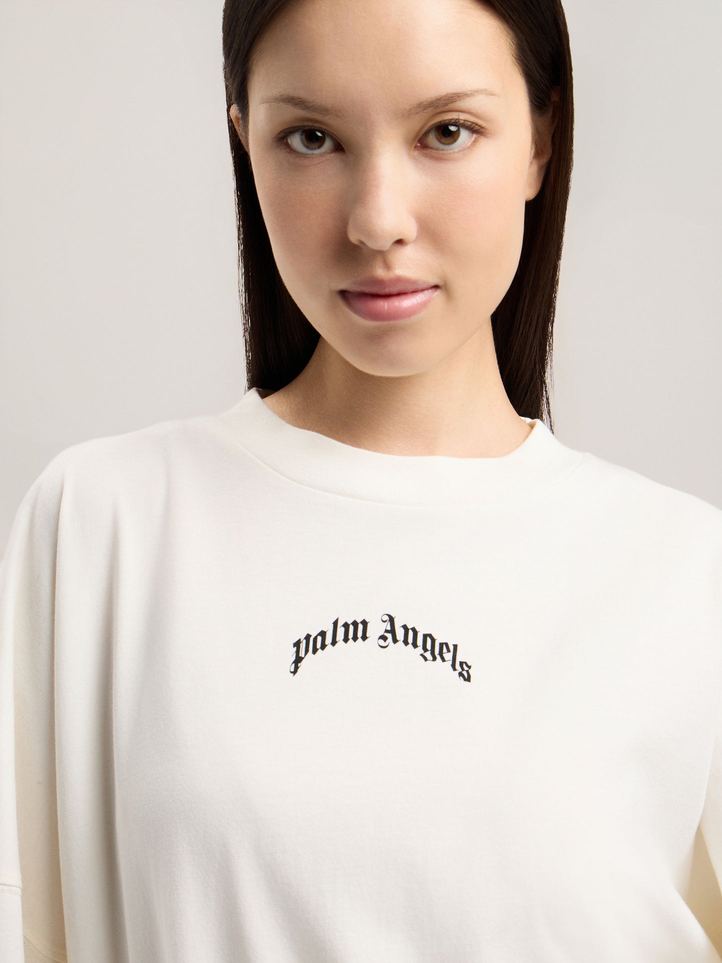 Curved Logo Over T Shirt