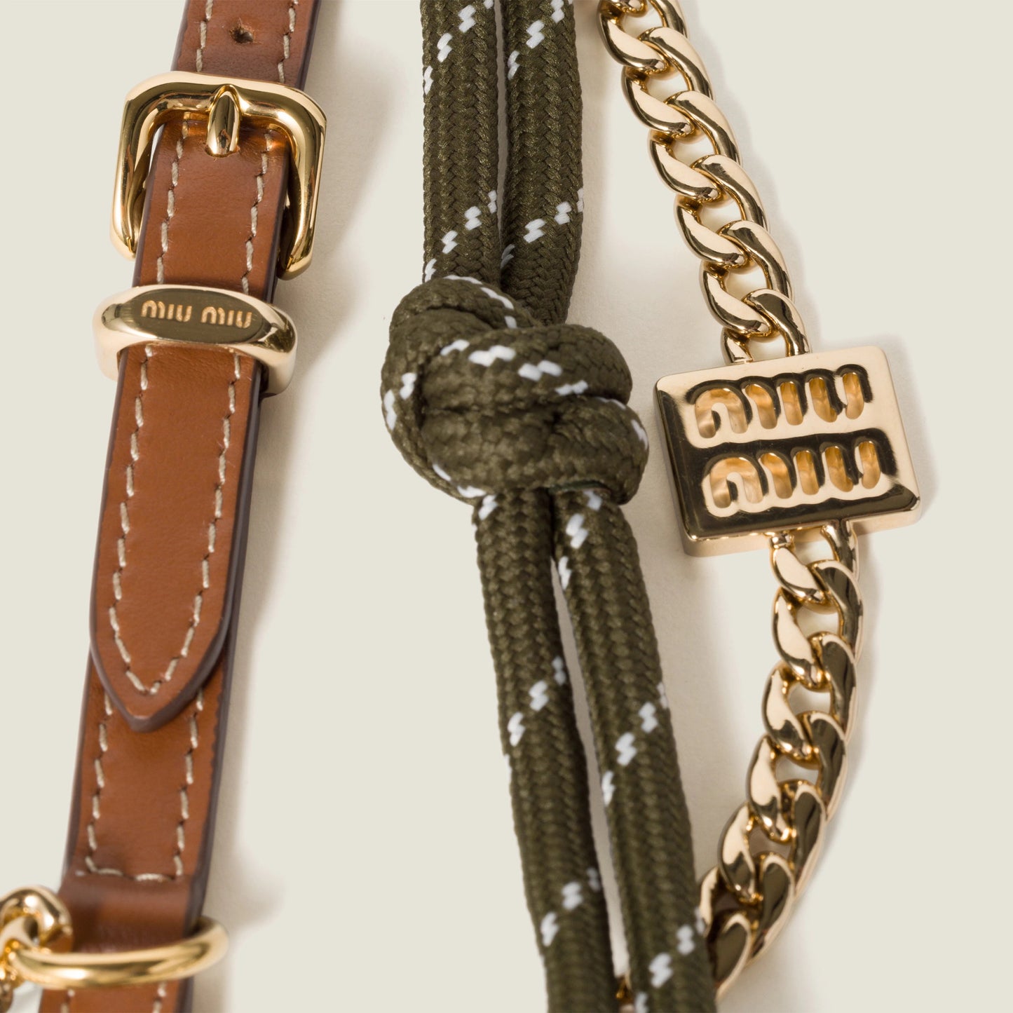 Leather, cord and metal trick keyring