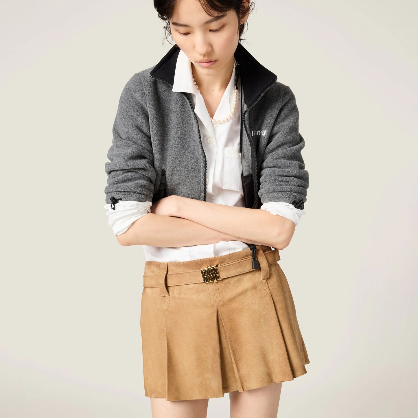 Pleated suede skirt