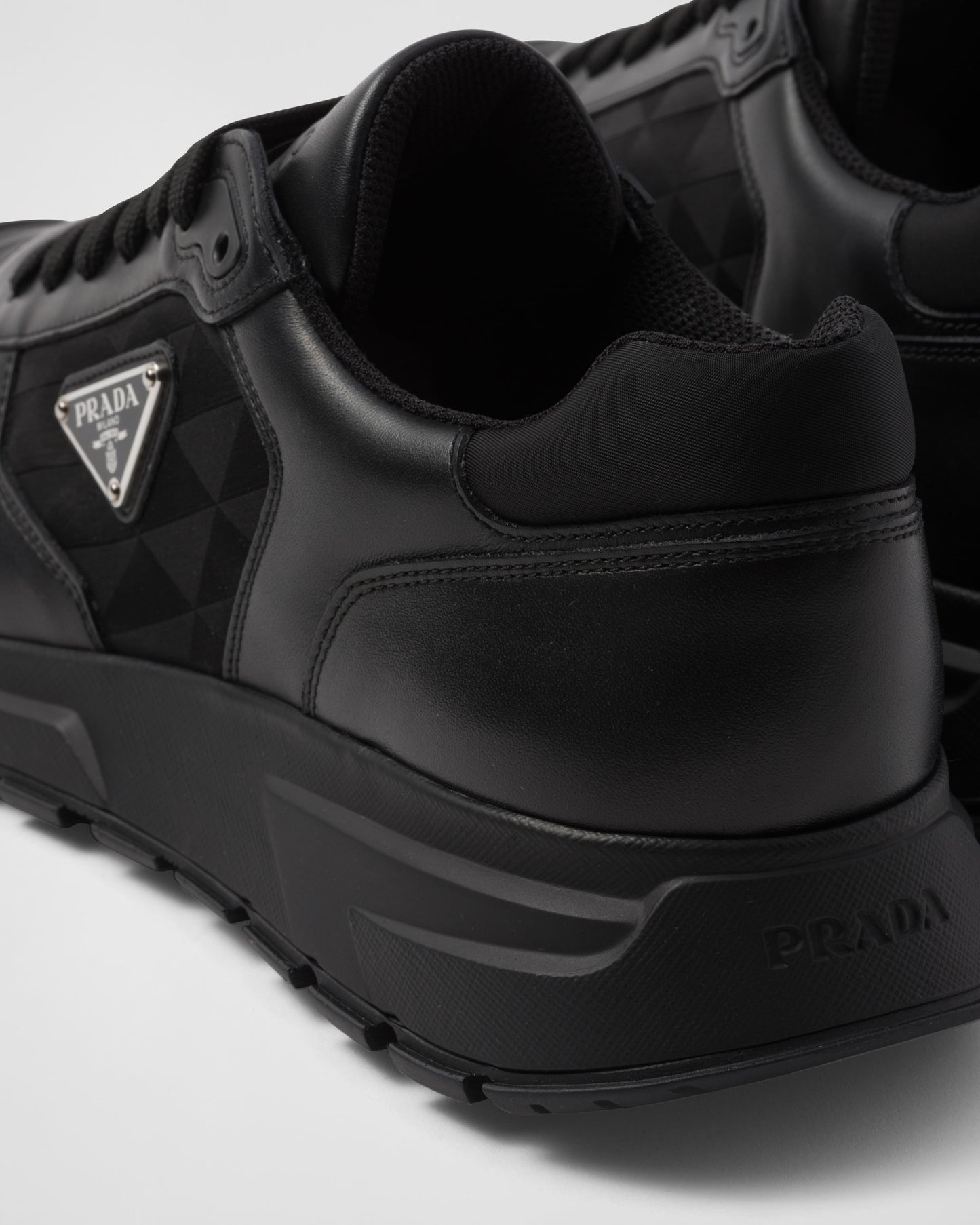 Leather and Re-Nylon high-top sneakers
