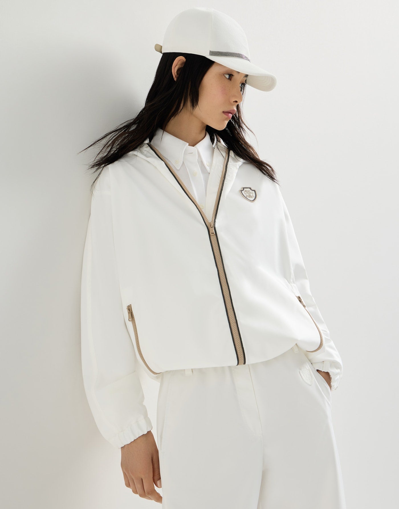 Nylon hooded outerwear jacket with logo and precious trims