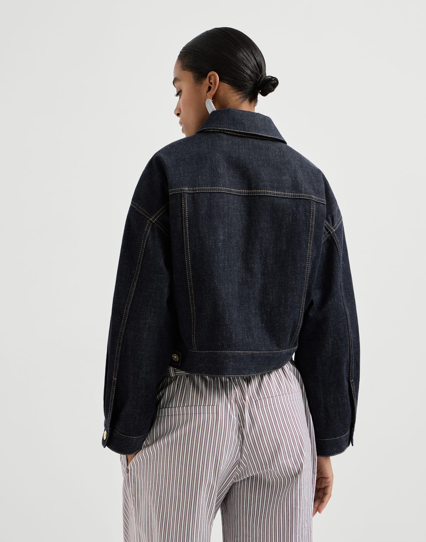 No-fade denim outerwear jacket with monili