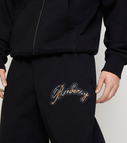 Check Cursive Logo Cotton Jogging Pants in Black