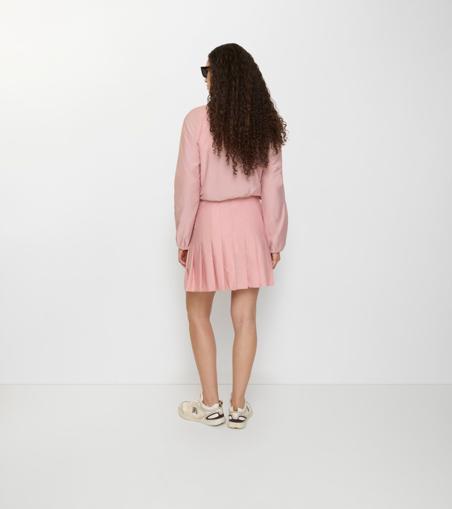 Pleated Stretch Nylon Mini Skirt in Begonia pink