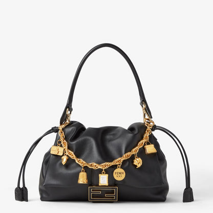 Charm Gold-colored metal charm
