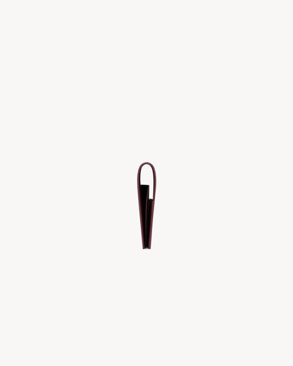 SAINT LAURENT PARIS passport case in patent leather