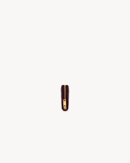 CASSANDRE change purse in GRAIN DE POUDRE leather