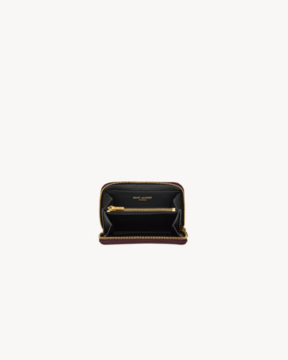 CASSANDRE change purse in GRAIN DE POUDRE leather