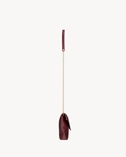 CASSANDRE small chain pouch in shiny leather