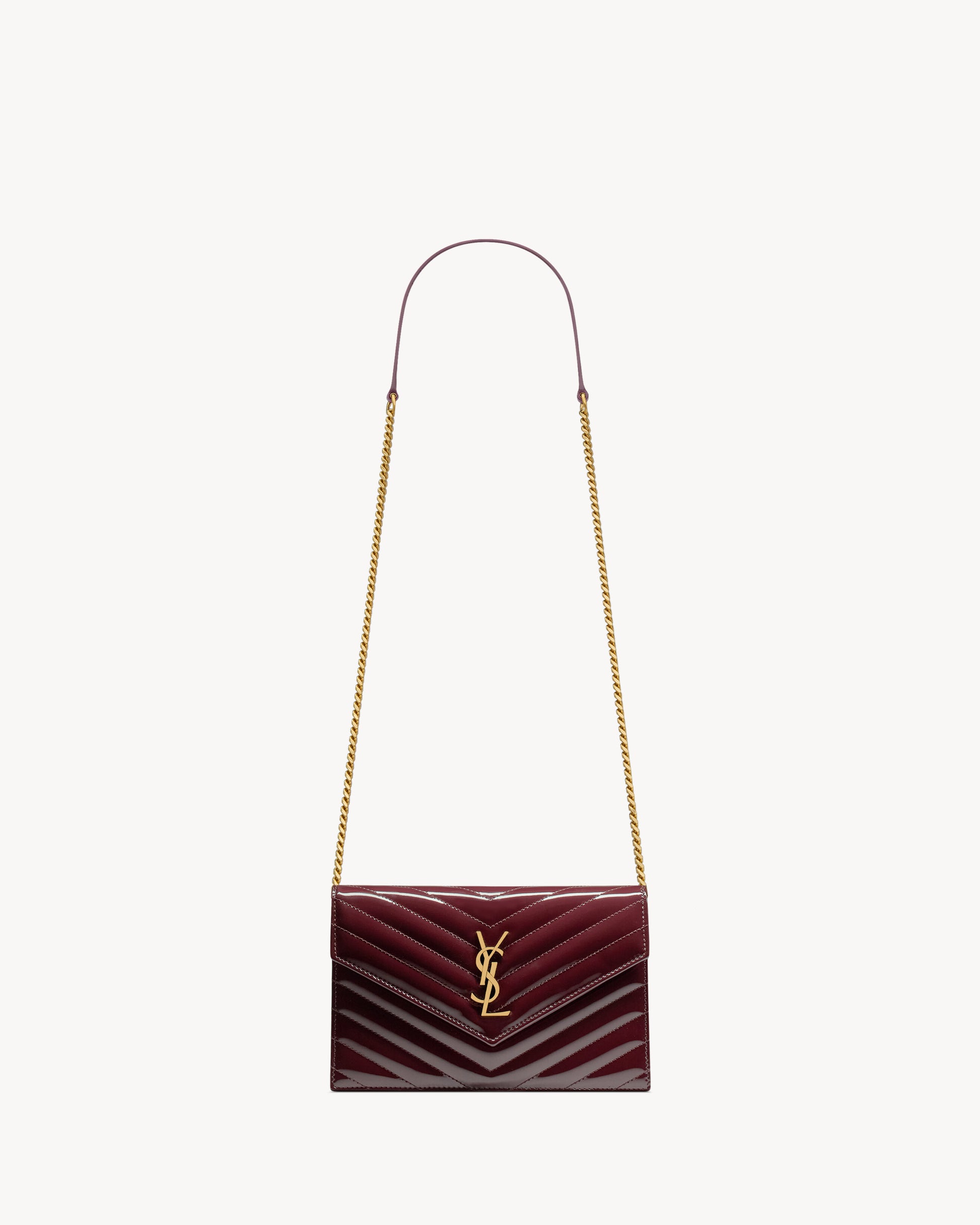 CASSANDRE envelope chain wallet in patent leather