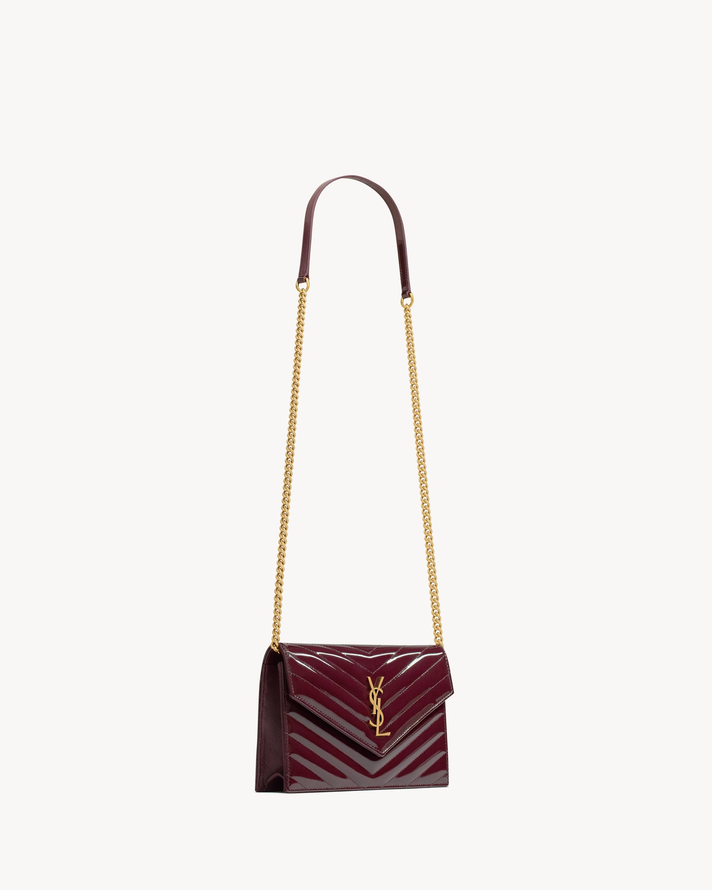 CASSANDRE envelope chain wallet in patent leather