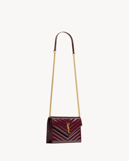 CASSANDRE envelope chain wallet in patent leather