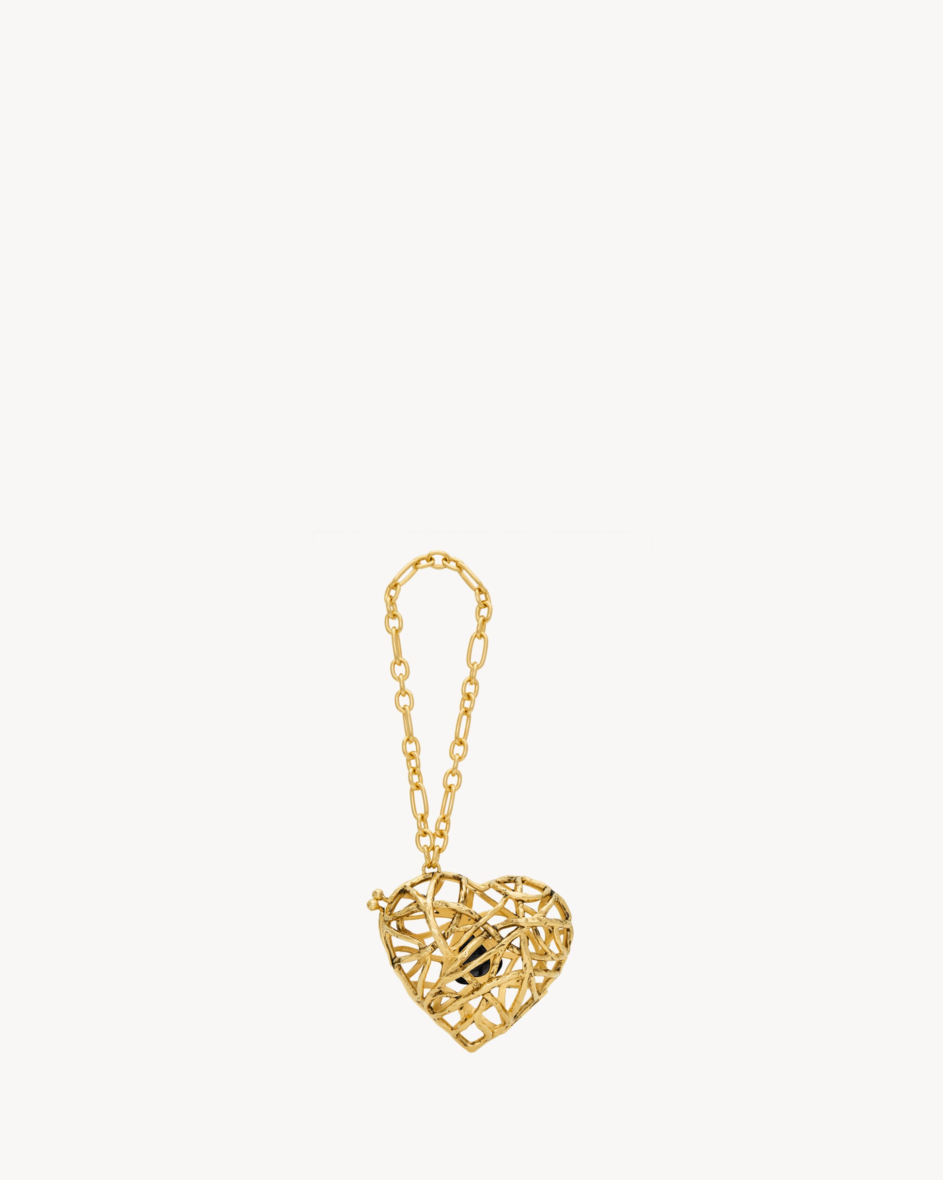 Evening heart minaudière in metal and stone
