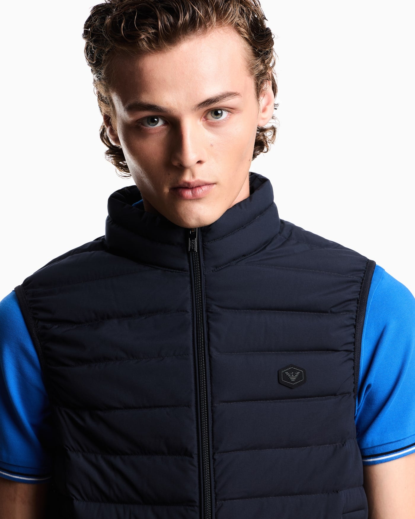 Sleeveless full-zip down jacket in quilted nylon with eagle logo patch