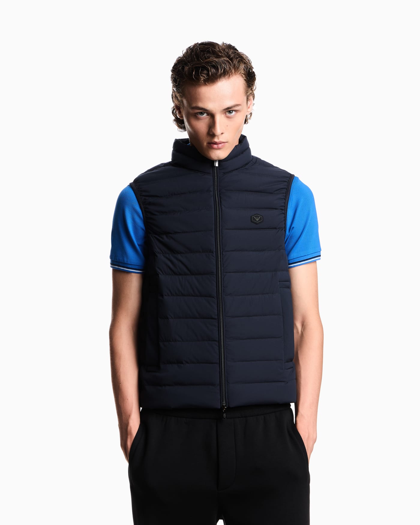 Sleeveless full-zip down jacket in quilted nylon with eagle logo patch