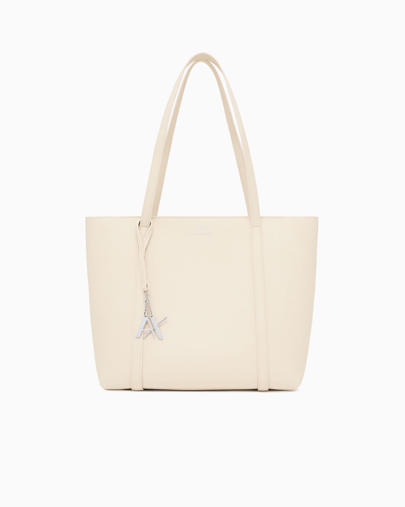 Textured tote bag with handles and a decorative charm