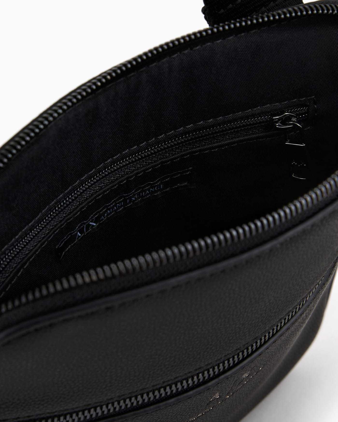 Semi-rigid flat shoulder bag with external pocket