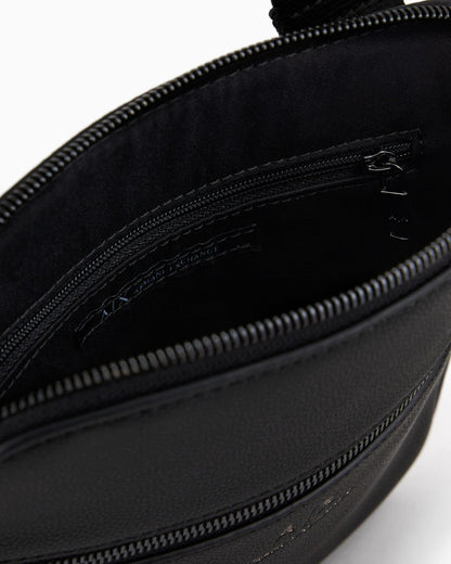 Semi-rigid flat shoulder bag with external pocket
