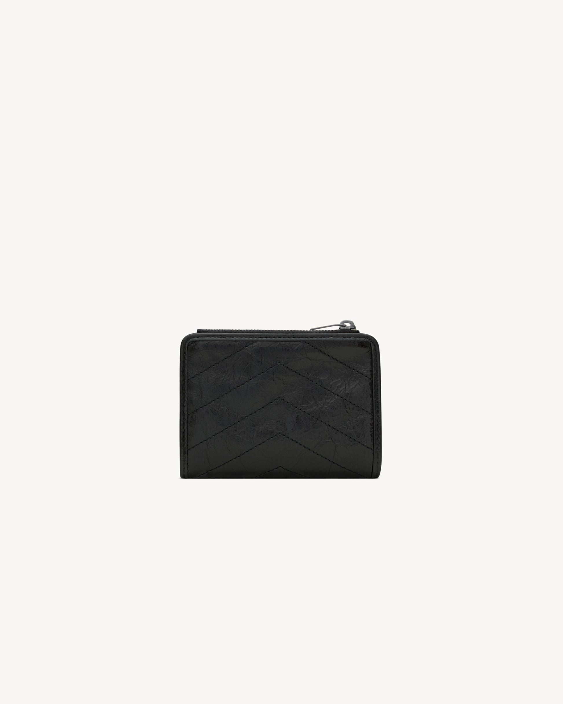 NIKI bi-fold wallet in vintage leather