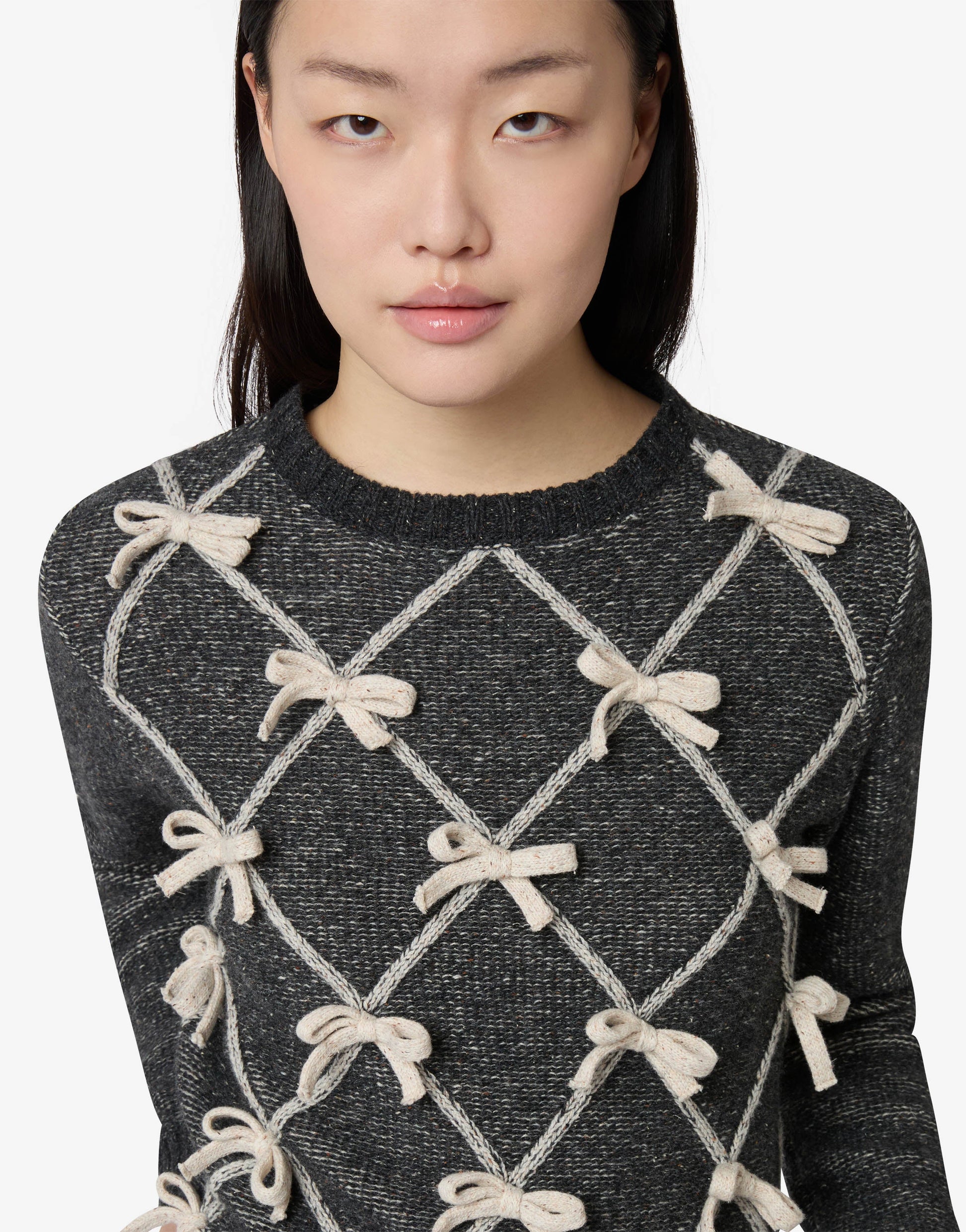 Pullover in misto lana e seta con fiocchi