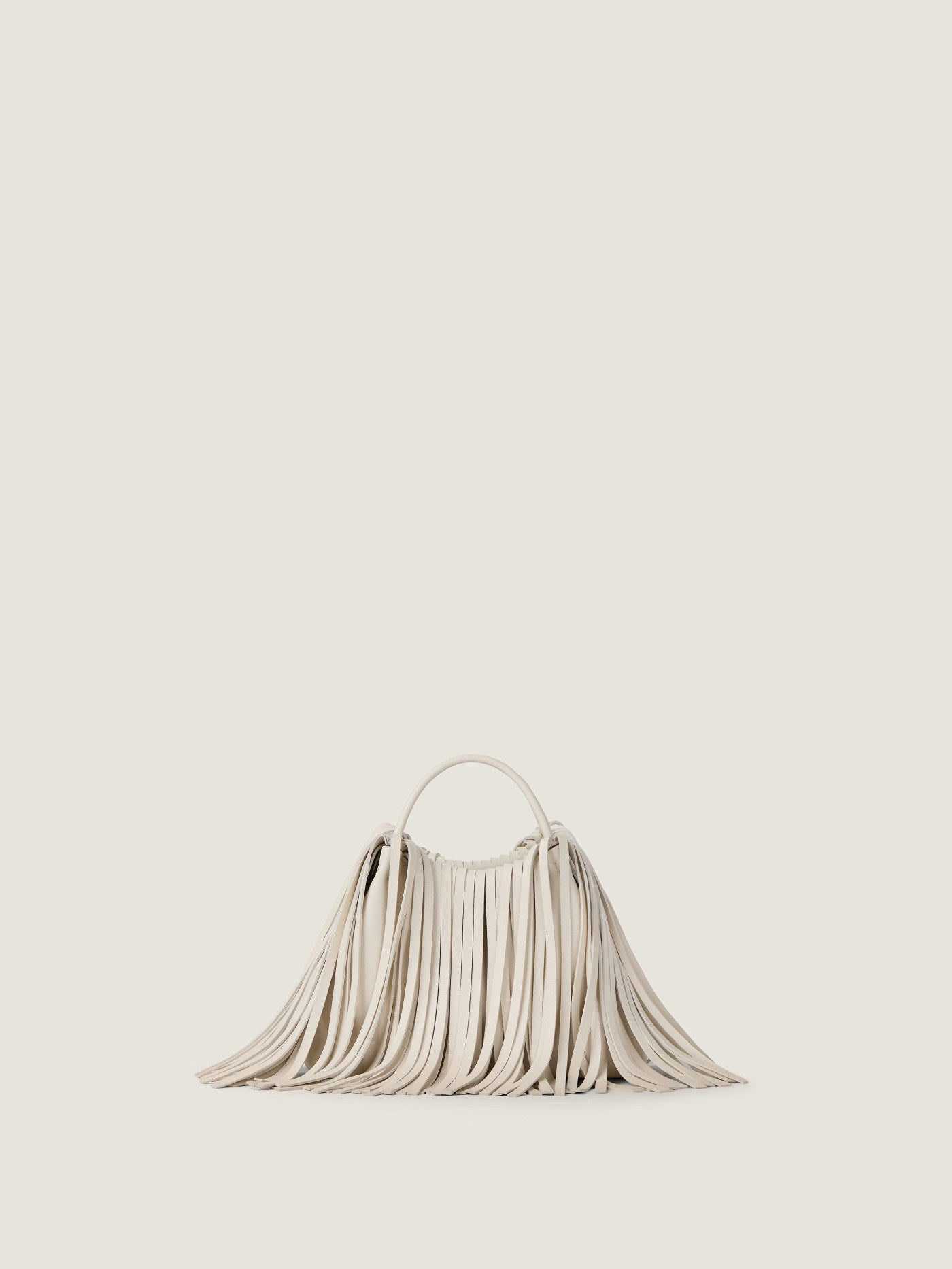 Nano Facet bucket bag in leather with fringes