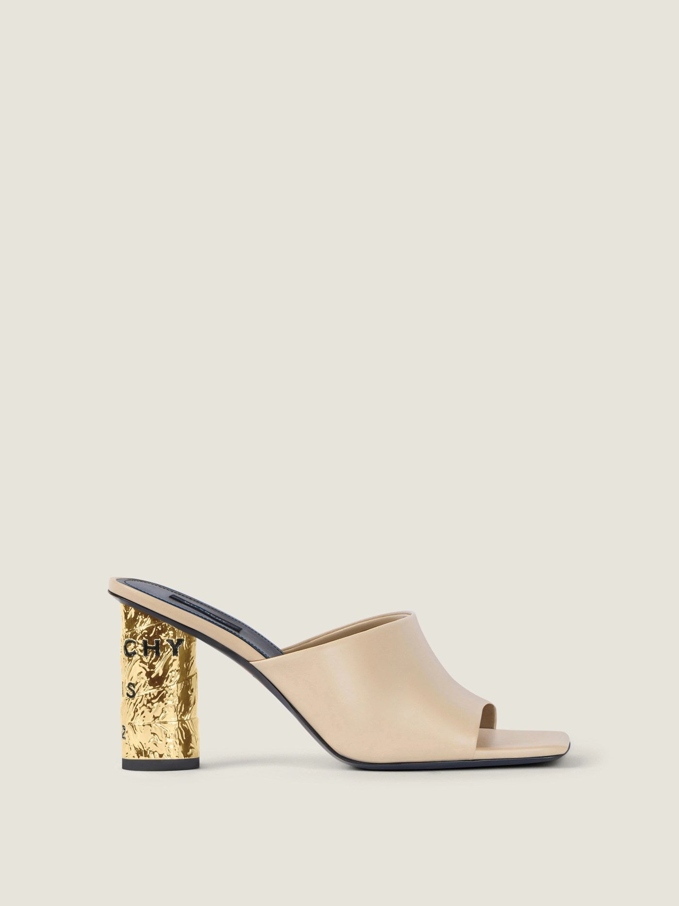 Tape heeled mules in leather