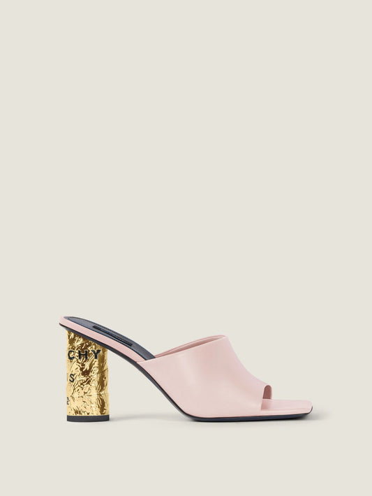 Tape heeled mules in leather