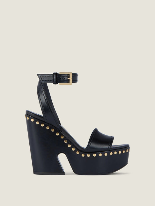 Clog platform sandals in leather with studs detail