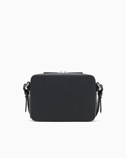 Textured crossbody bag with a front pocket and a metal logo