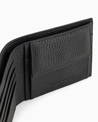 Leather coin-pocket wallet with all-over embossed eagle