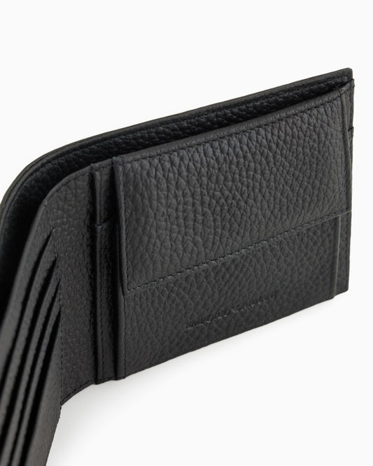 Leather coin-pocket wallet with all-over embossed eagle