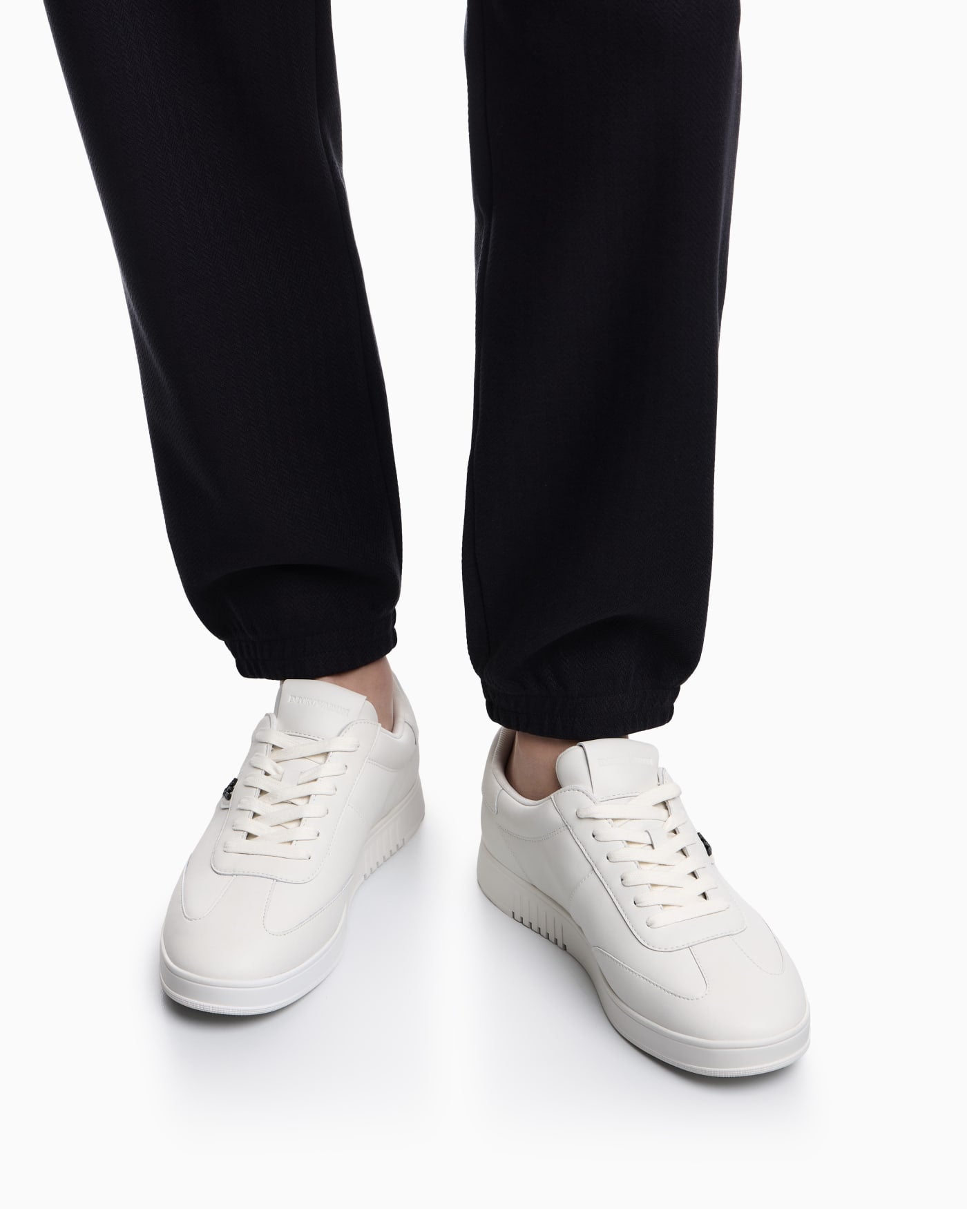 Leather sneakers with eagle plate