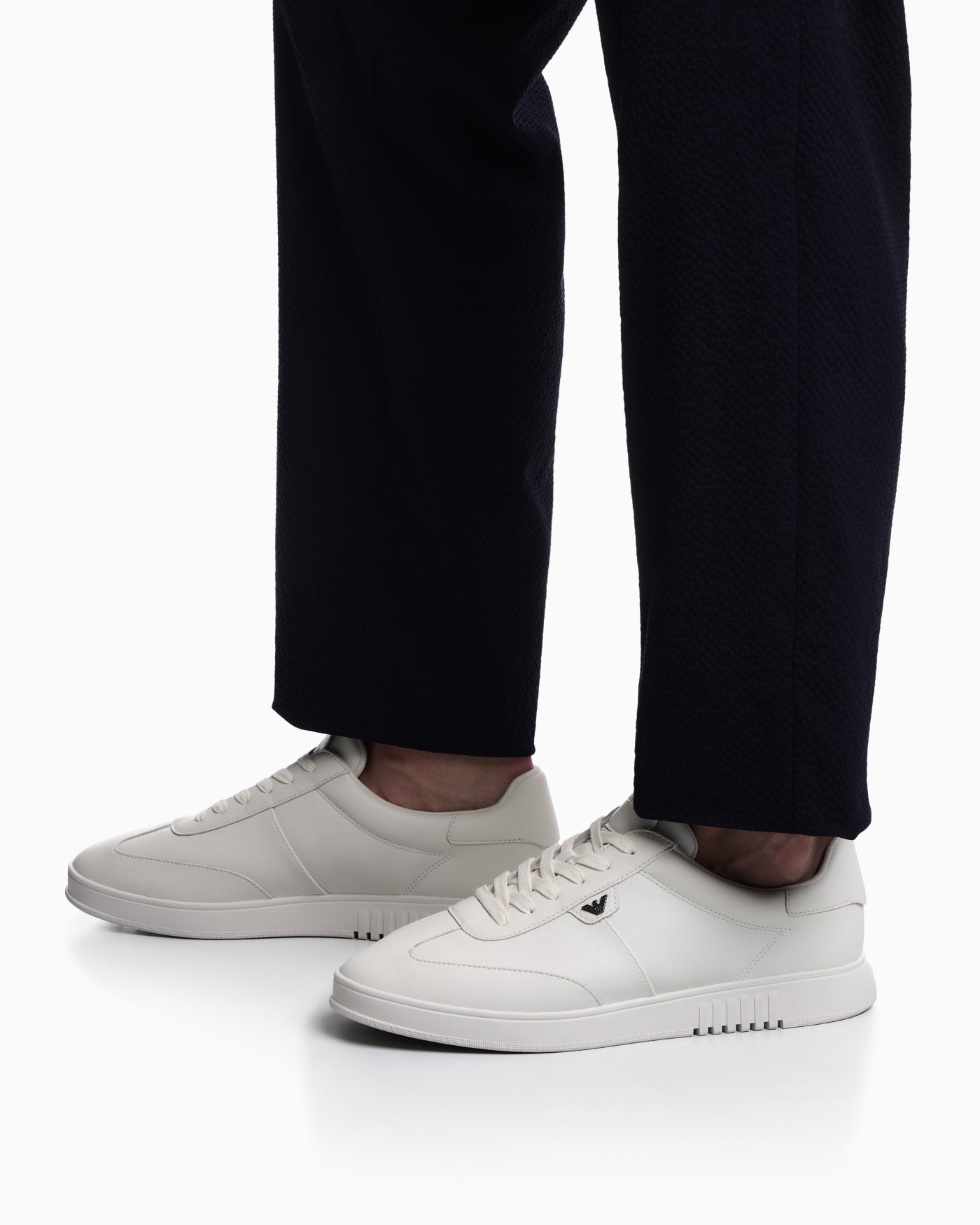 Leather sneakers with eagle plate