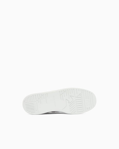 Leather sneakers with an embossed logo and contrasting panel