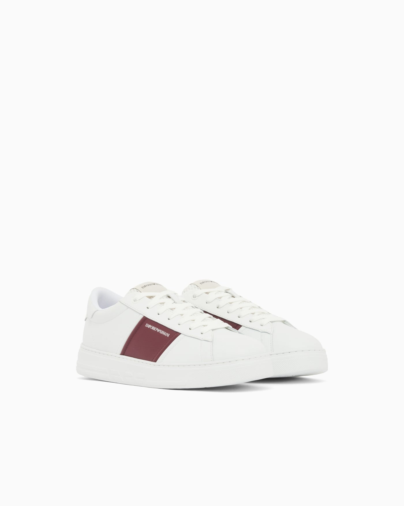 Leather sneakers with an embossed logo and contrasting panel