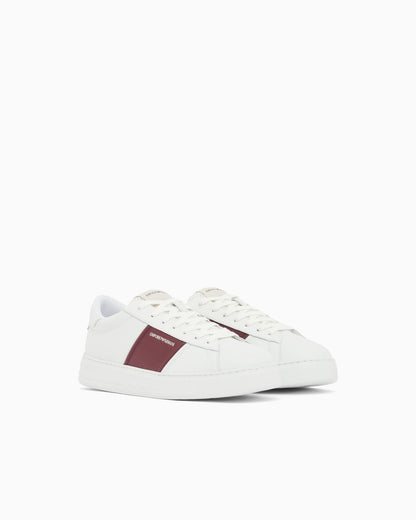 Leather sneakers with an embossed logo and contrasting panel