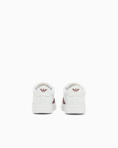 Leather sneakers with an embossed logo and contrasting panel