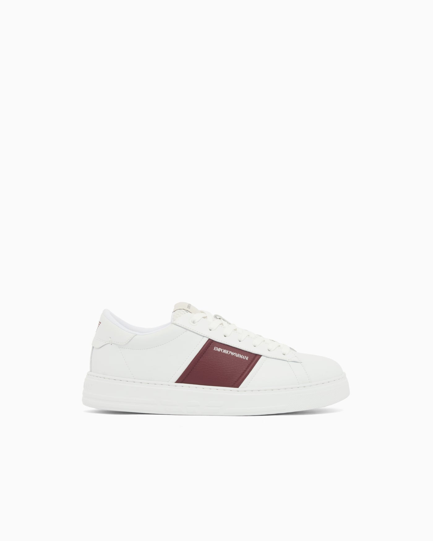 Leather sneakers with an embossed logo and contrasting panel