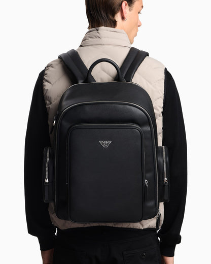 Backpack with a metallic logo and silver-tone zips