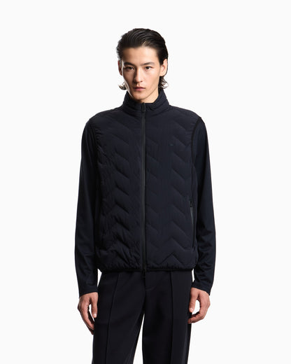 Nylon down jacket sleeveless with a chevron quilt Essential