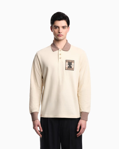 Piqué polo shirt with patch and tribal print
