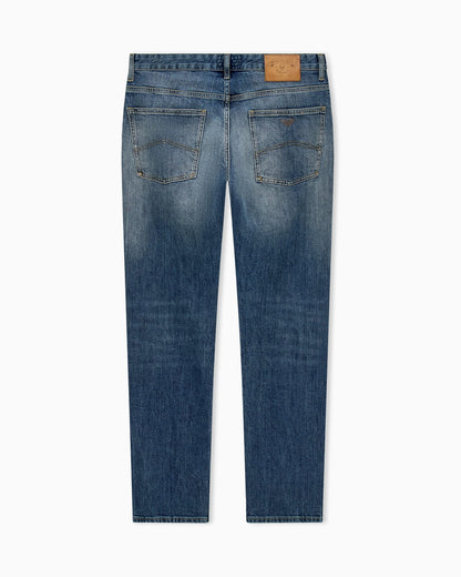 Straight-leg denim jeans with faded wash and whiskering