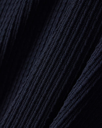 Polo collar sweater in wool and lyocell blend with patterned knit