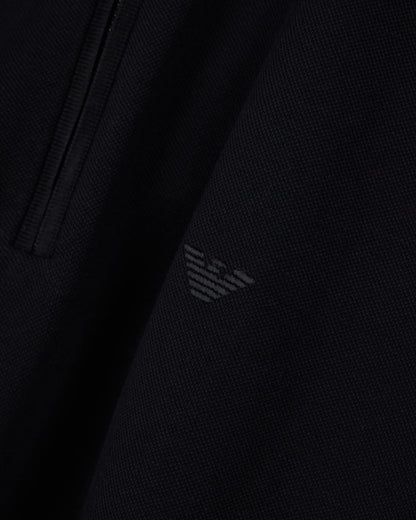 Polo shirt in piqué with partial zip